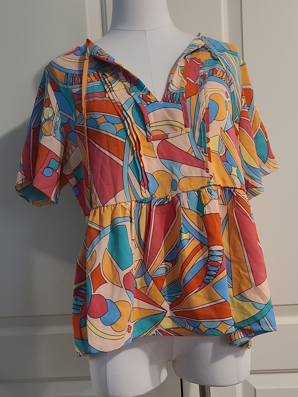 NWOT Multicolor Abstract Peplum Top